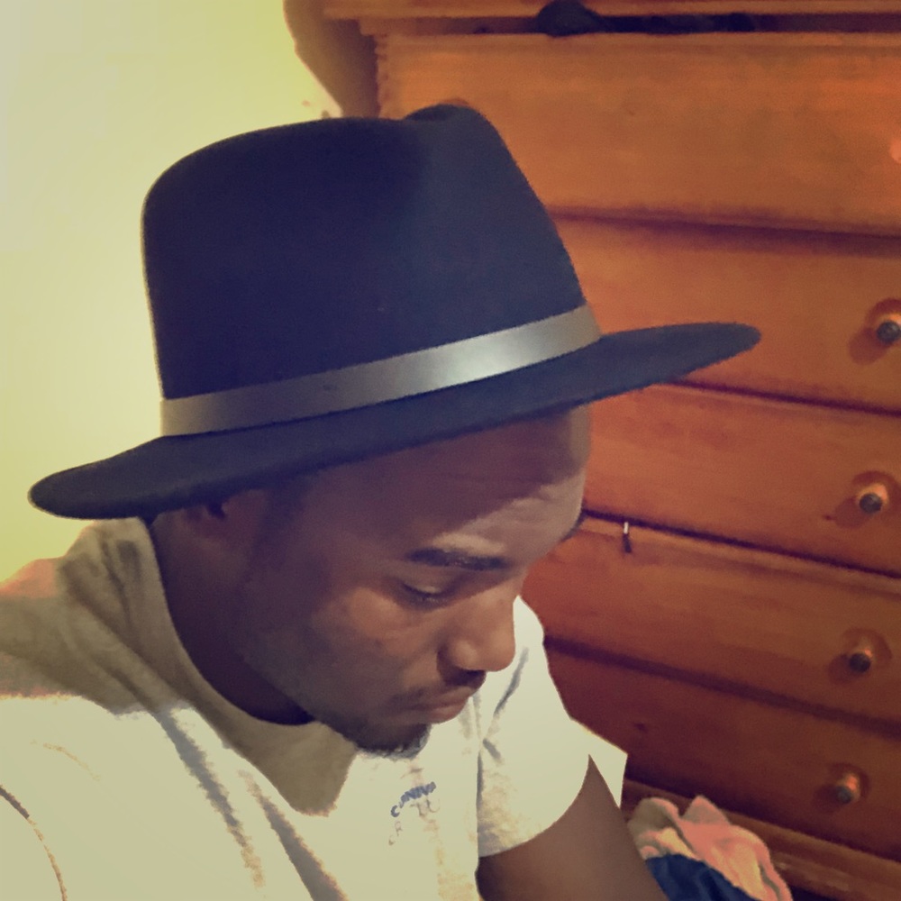 Fedora medium to wide brim hat